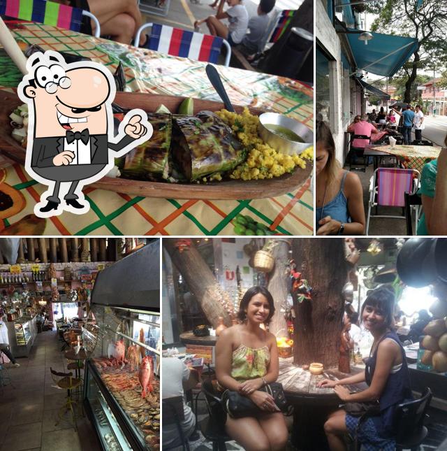 Sente em uma das mesas no Peixaria bar e venda