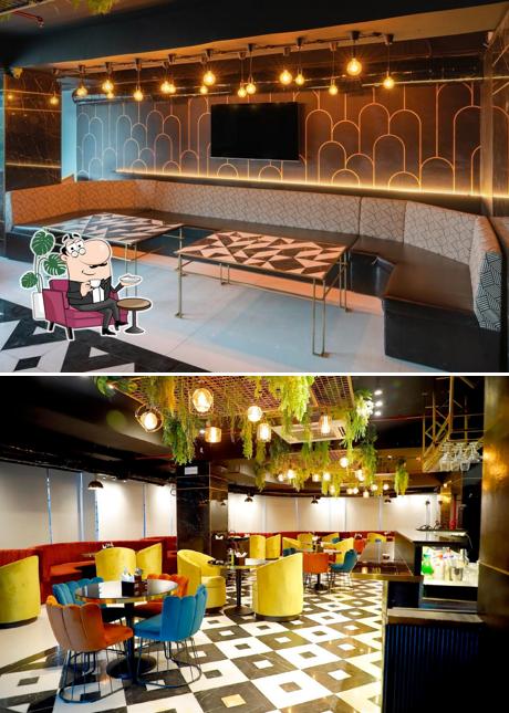 Take a seat at one of the tables at The Maverick Lounge