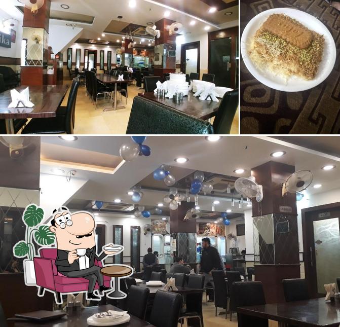 Take a seat at one of the tables at Zaika Foods