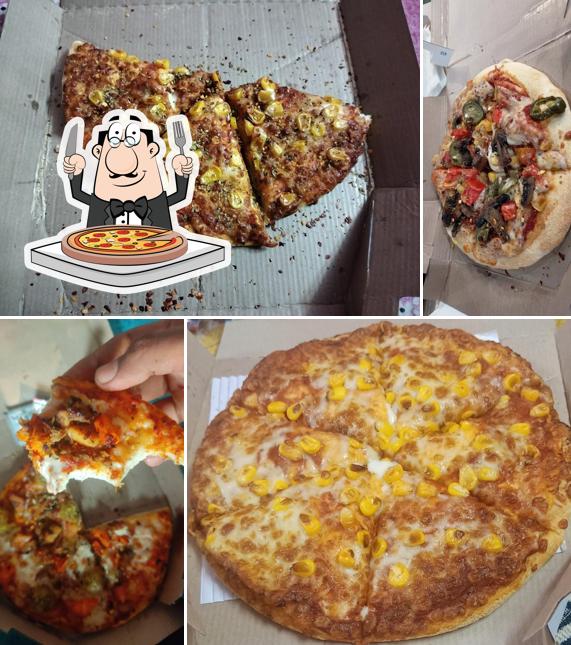 At Domino's Pizza Vishnu Nagar, Palghar, you can enjoy pizza