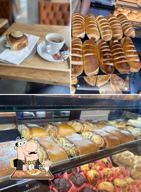 Questa è la immagine che mostra la cibo e interni di Happy Baker