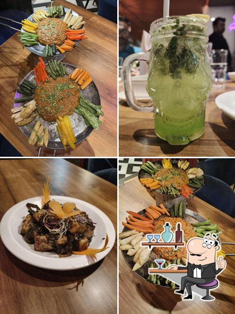 Take a seat at one of the tables at The Rasoiya Street Pure Veg Restaurant In J.P. Nagar