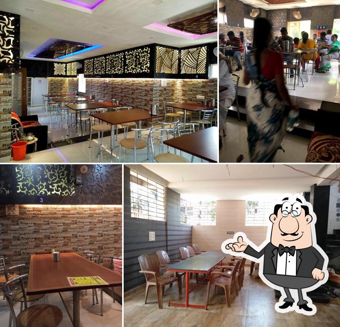 Take a seat at one of the tables at Naidu Military hotel