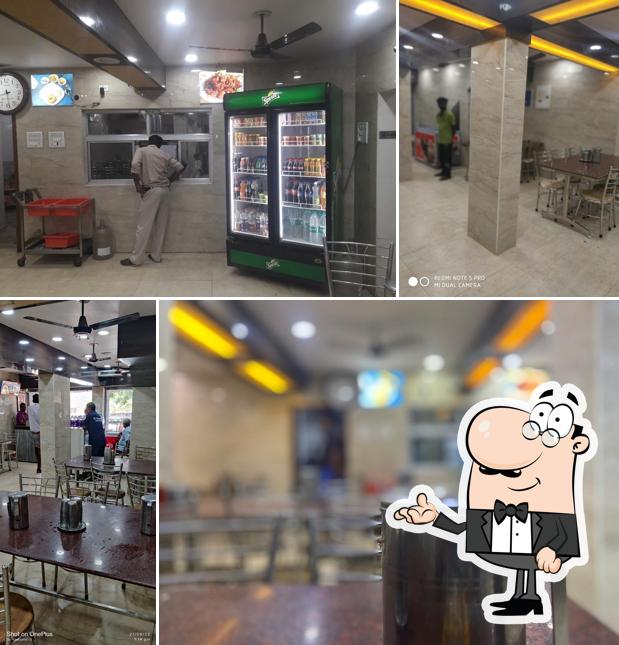 Take a seat at one of the tables at Sri Saravana Bhavan