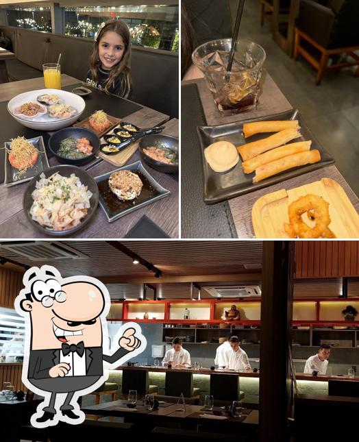 Sente em uma das mesas no Jun Kappô Sushi