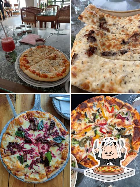 Try out pizza at The Arches Cafe & Bakery