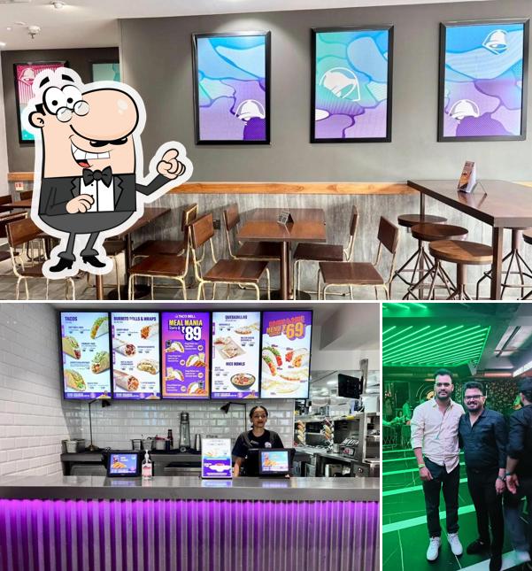 Take a seat at one of the tables at Taco Bell - Punjabi Bagh