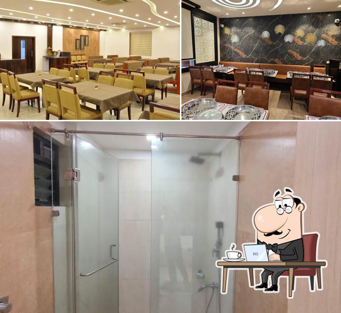 Take a seat at one of the tables at Hotel Celebration