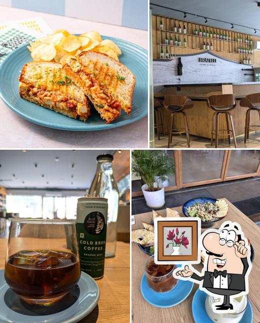 Take a seat at one of the tables at Blue Tokai Coffee Roasters