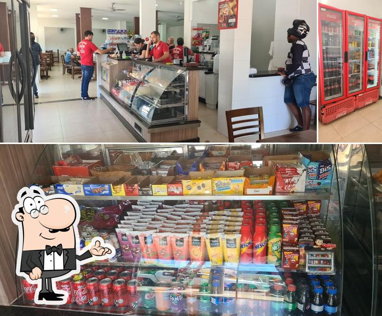 Sente em uma das mesas no Restaurante Do Celso