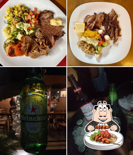 Entre diferentes coisas, comida e bebida podem ser encontrados no Brazolia Cozinha E Bar