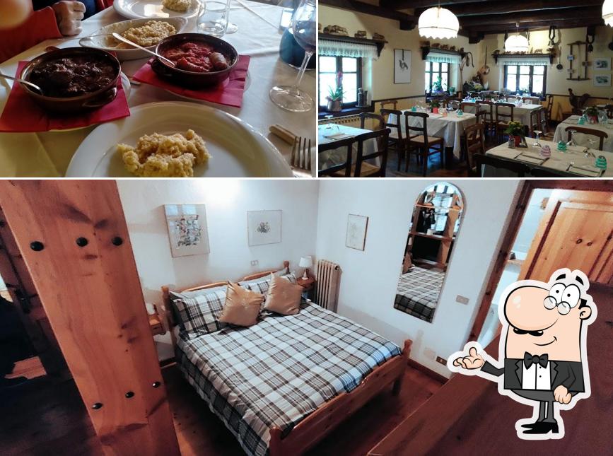 La immagine di interni e cibo da Albergo Lago del Laux residence