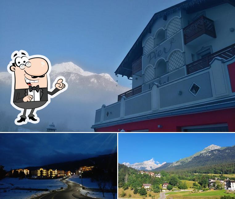 Puoi goderti l'aria fresca da seduto all'esterno di Pier Hotel