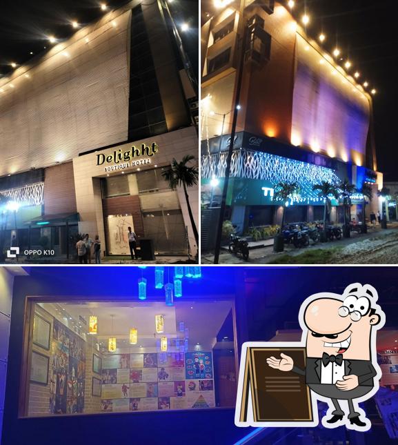 Check out the photo displaying exterior and beverage at Delighht Boutique Hotel