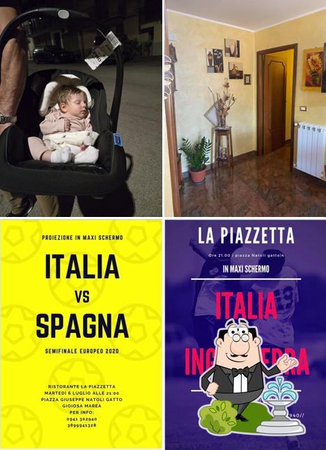 Puoi goderti l'aria fresca da seduto all'esterno di La Piazzetta
