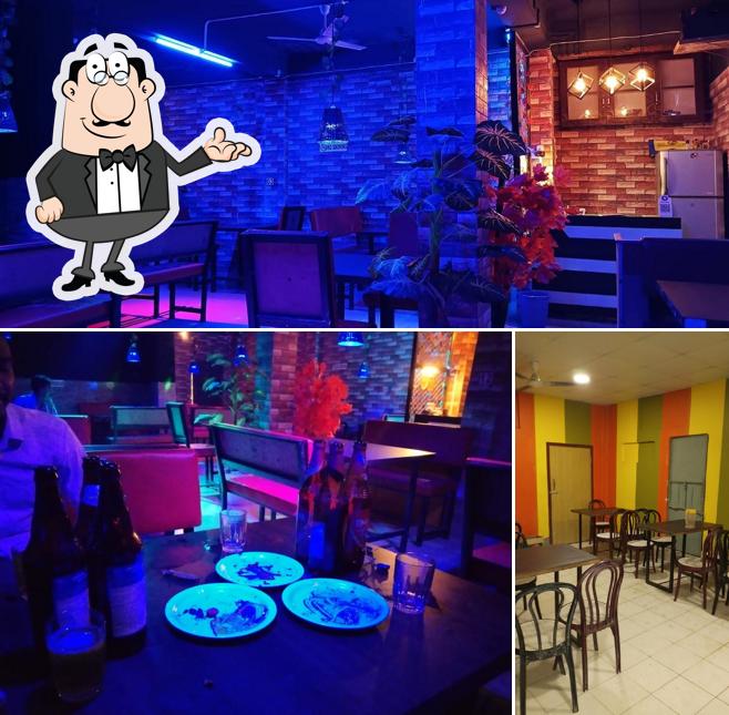 Take a seat at one of the tables at RUMA BAR