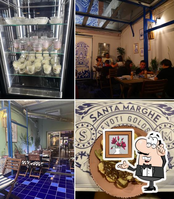 Dai un'occhiata agli interni di Pizzeria Santa Marghe