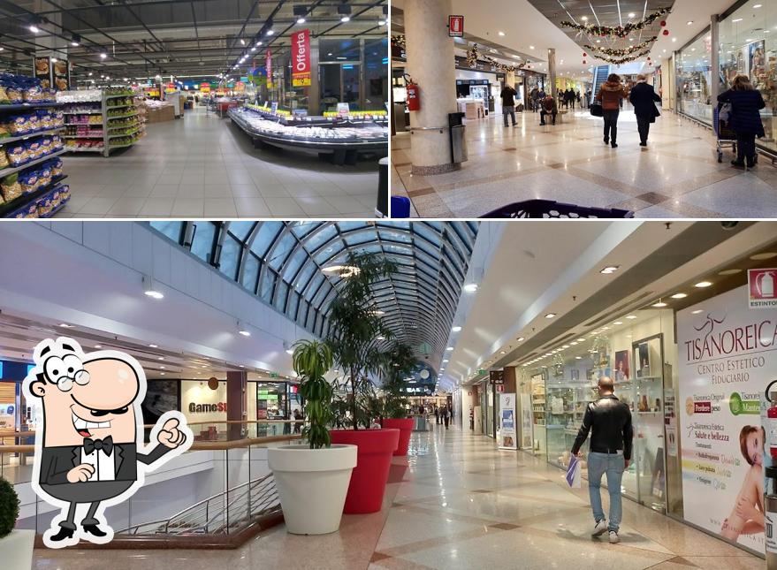 Siediti a un tavolo di Centro Commerciale Brianza
