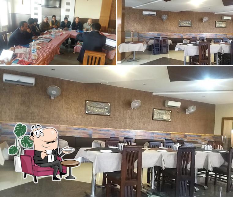 Take a seat at one of the tables at Kabira Prem Nisagra