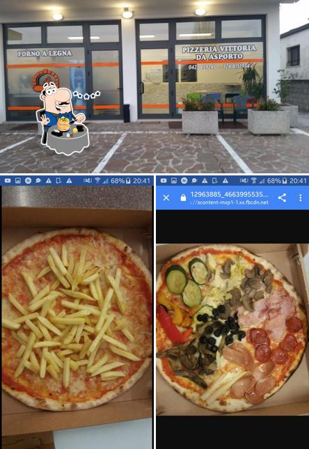 Tra le diverse cose da Pizzeria Vittoria si possono trovare la cibo e esterno