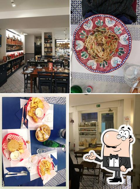 Dai un'occhiata agli interni di Melius Salumeria con Cucina Dai un'occhiata agli interni di Melius Salumeria con Cucina