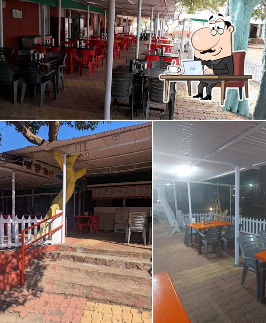 Take a seat at one of the tables at Sonali Pride of Dining Restaurant