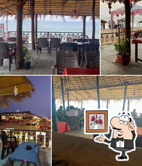 Take a seat at one of the tables at Drop Inn Shack by Dodson