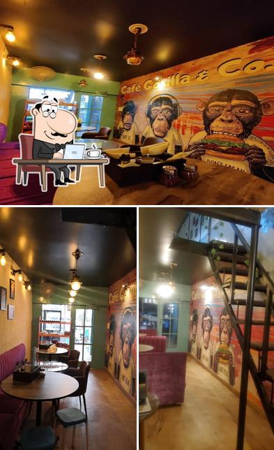 Take a seat at one of the tables at Cafe Gorilla & co. Best Restaurant in Amritsar
