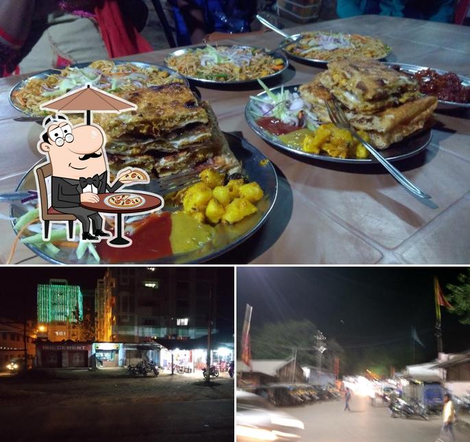 The photo of exterior and food at Zaika Food Corner