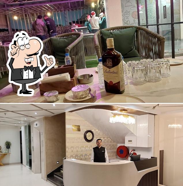 Take a seat at one of the tables at Hotel Emerald