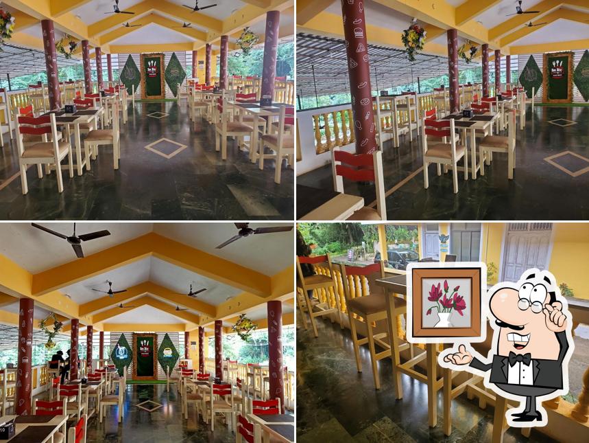 Take a seat at one of the tables at Hot Bite Restaurant