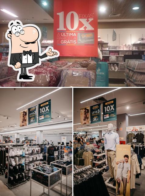 Sente em uma das mesas no Lojas Torra