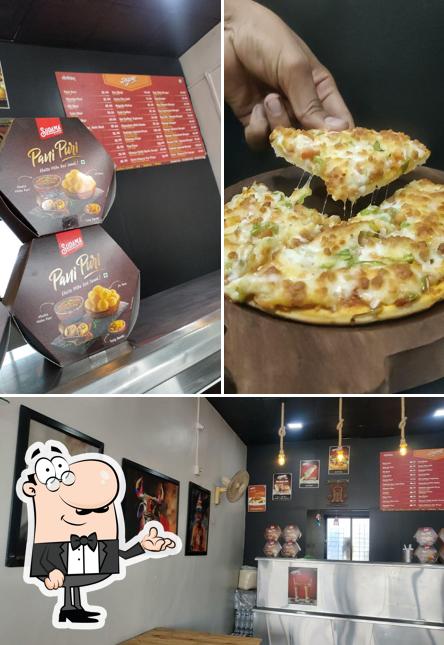 Take a seat at one of the tables at Sudama Bhel & Sharvi Food Court _Tulapur Phata