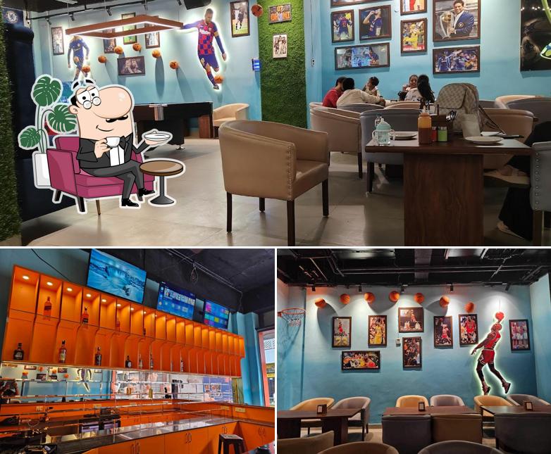 Take a seat at one of the tables at Dug Out Lounge