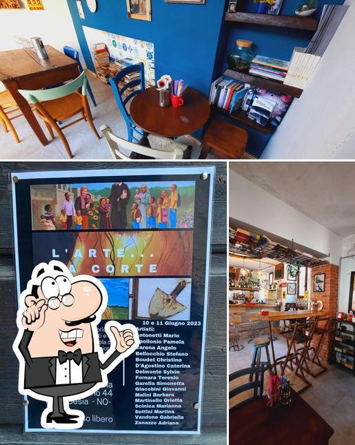 Dai un’occhiata alla foto che raffigura la interni e bevanda di Nel Cortile di Maria Caffè&Curiosità