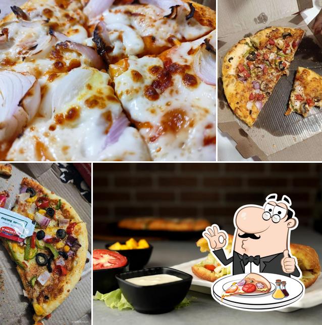 At Pizza Wings Dwarka Mor, you can get pizza