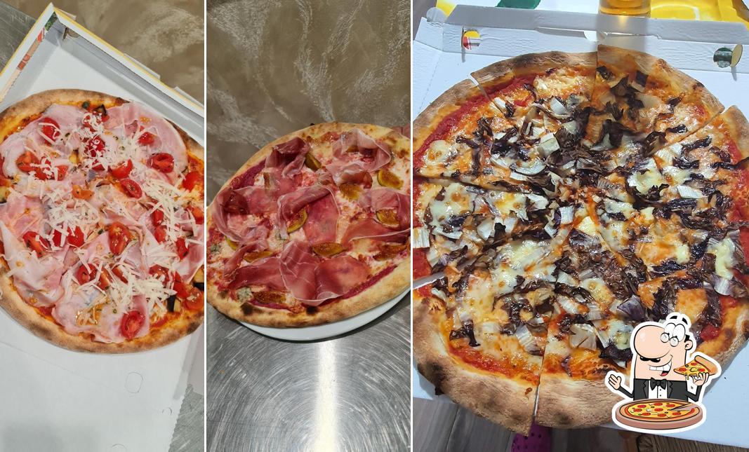 A Pizzeria alla Spiga, puoi ordinare una bella pizza
