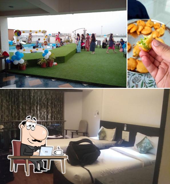 Take a seat at one of the tables at The Oasis Hotel