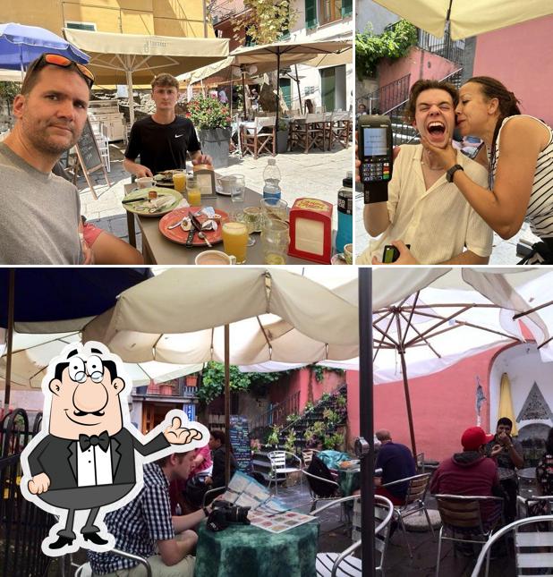 Dai un’occhiata alla immagine che presenta la interni e esterno di Caffè Matteo