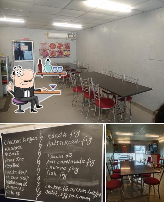 Among various things one can find interior and blackboard at Nila Mess