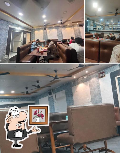 Take a seat at one of the tables at Sri Surya Dhaba