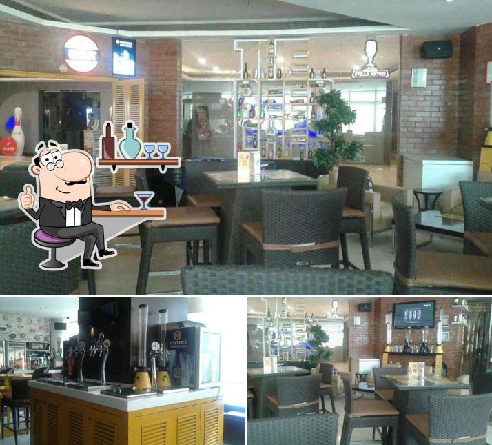 Take a seat at one of the tables at The Beer Café Take a seat at one of the tables at The Beer Café