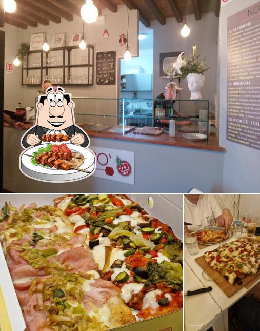 Questa è la foto che presenta la cibo e interni di Pizzeria Ancora un po’