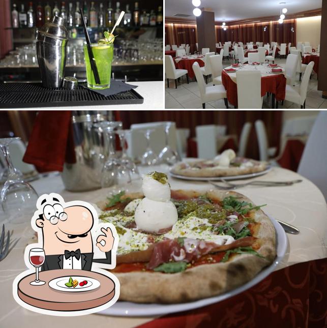 Questa è la immagine che mostra la cibo e interni di Sweet life Ristorante Pizzeria B&B Termini Imerese