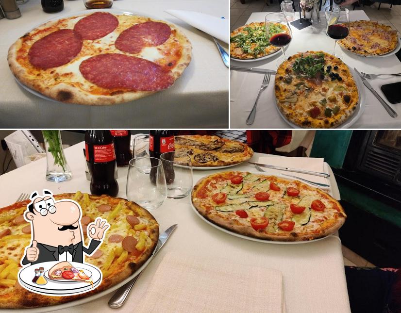 Prenditi una pizza a Trattoria Vittoria