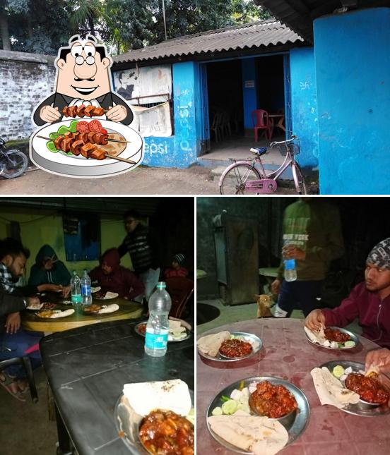 The photo of food and exterior at Gope Hotel