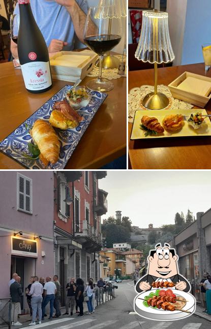 Tra le diverse cose da Vinoteca Canu si possono trovare la cibo e esterno