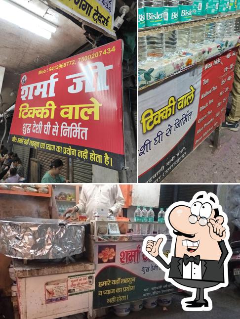 This is the image showing interior and food at Sharma Ji Tikki Wale