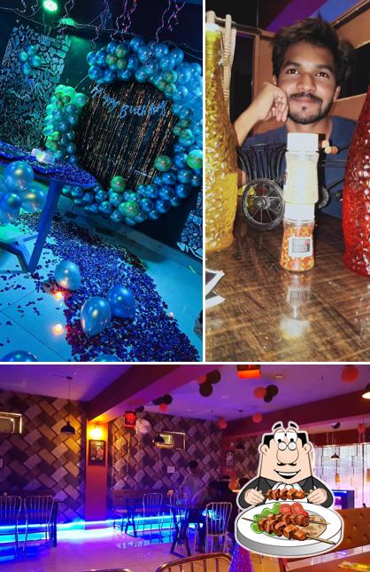 The photo of food and interior at The Joker Cafe & Rooftop Restaurant