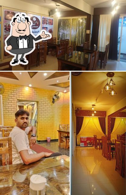 The interior of Hotel Triangle Hot And Spicy Veg and NonVeg Family Restaurant